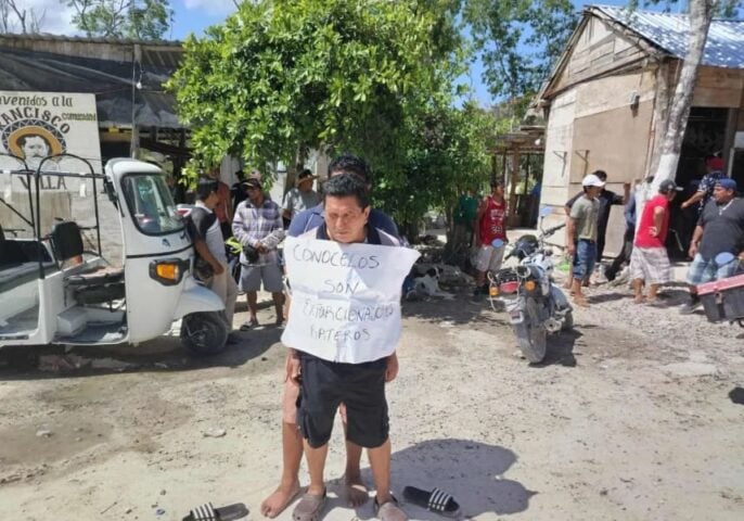 Los residentes de PDC enojados capturan pares por intentar extorsionar todo el vecindario